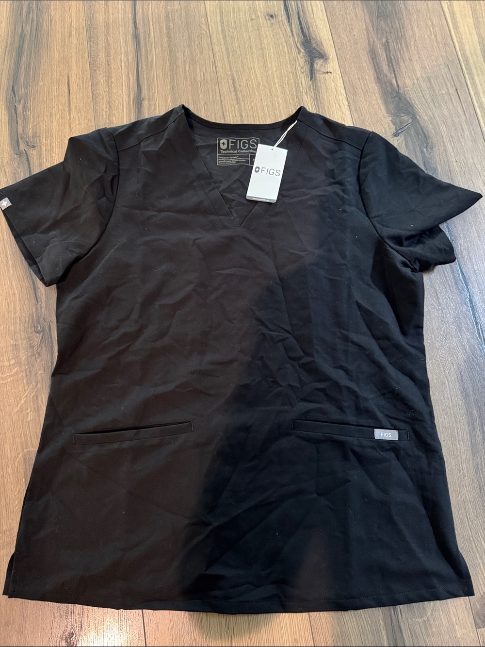 Figs Women's Black V-Neck Scrub Top with Front Pockets